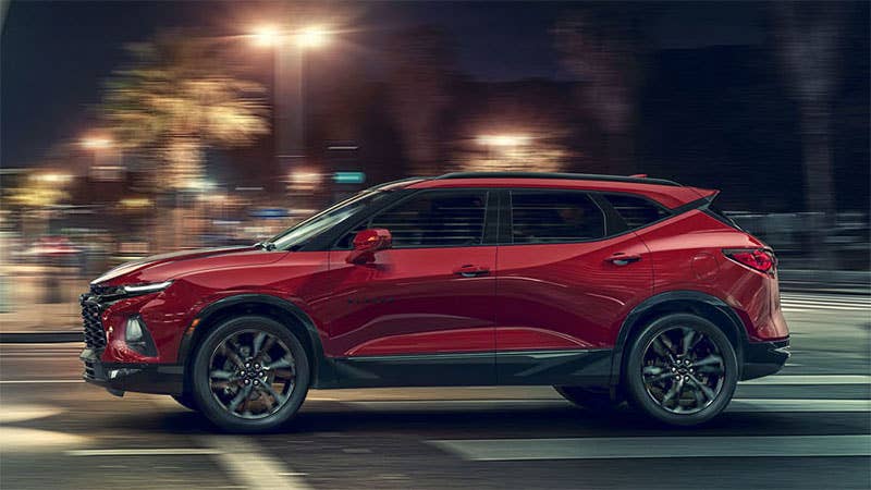 A red 2019 Chevrolet Blazer, side view.