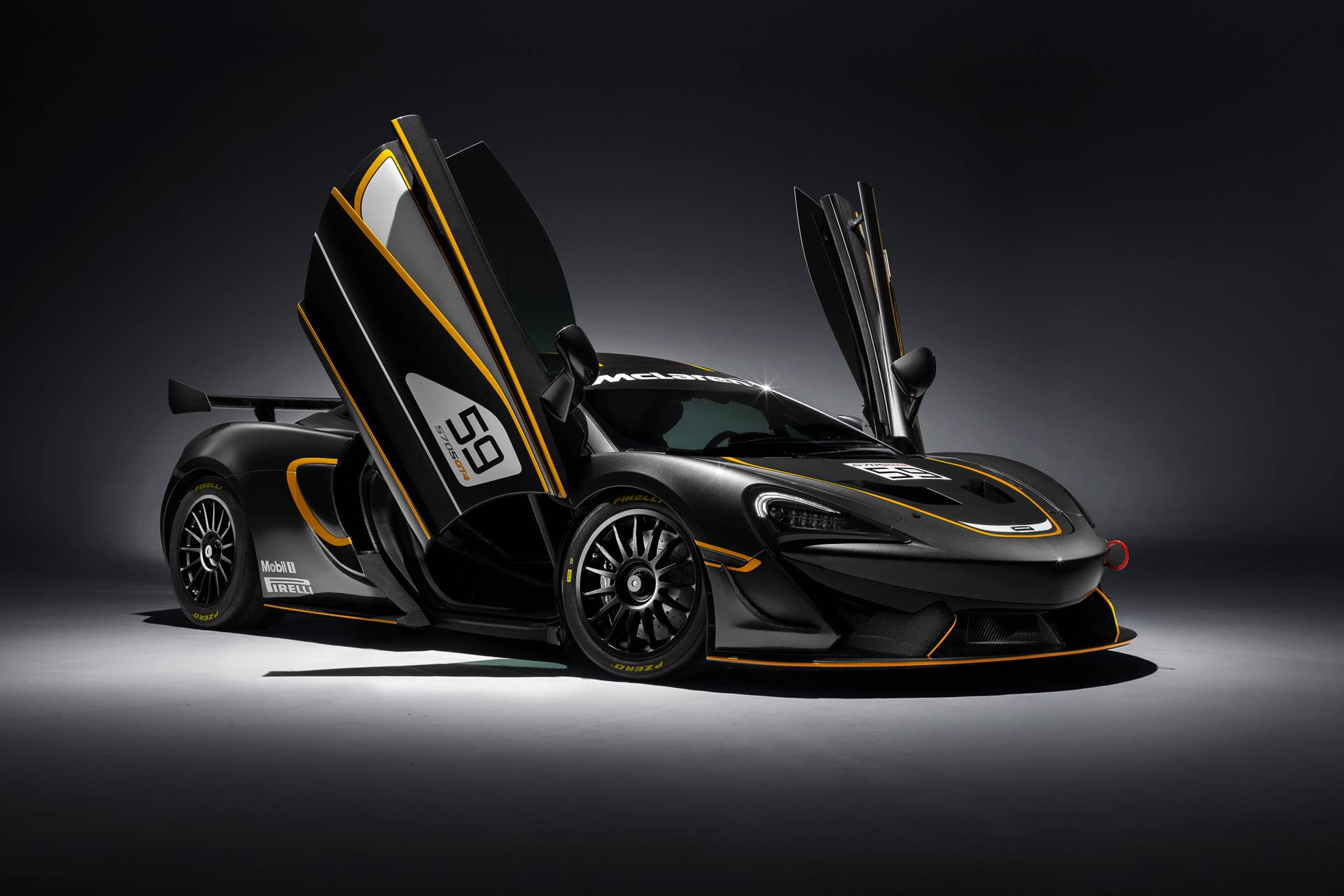 McLaren 570S GT4 front 3/4 doors up