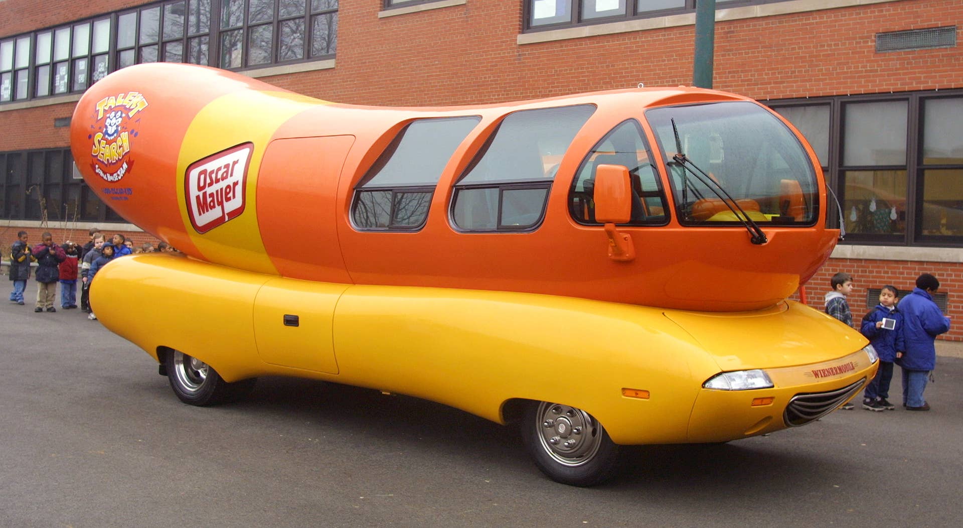 400014 05: An Oscar Mayer Wienermobile is parked January 23, 2002 outside the Oscar Mayer Elementary School in Chicago. Oscar Mayer kicked off a national classroom vocal contest at Chicagos Oscar Mayer Elementary School to recognize and encourage performing arts in Education. The school was presented $10,000 worth of musical equipment and tours of one of four Wienermobiles parked in the schools playground as a thank you from Oscar Mayer for helping to support the kick-off of the School House Jam talent search contest. (Photo by Tim Boyle/Getty Images)