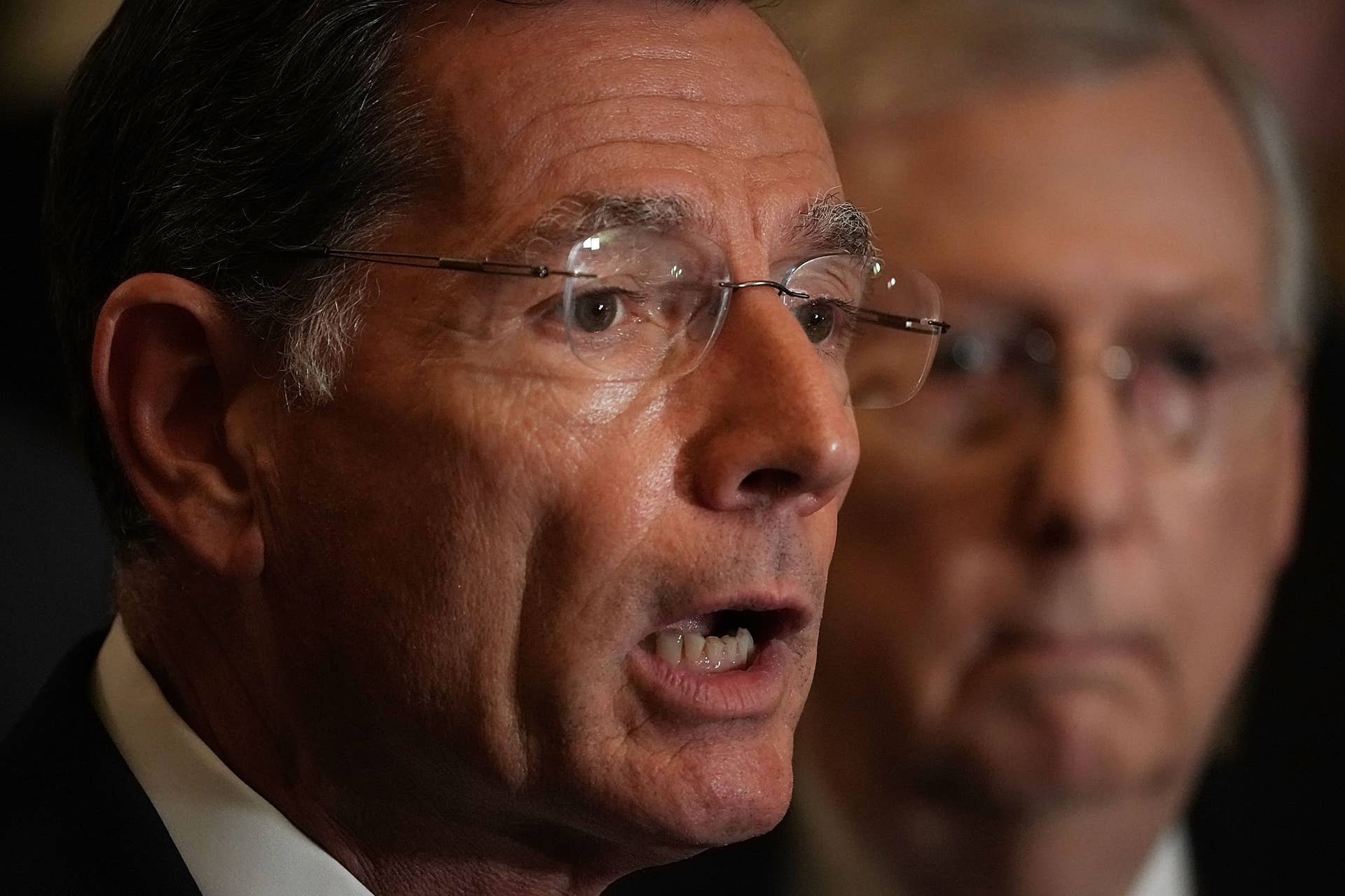 WASHINGTON, DC - OCTOBER 10: U.S. Sen. John Barrasso (R-WY) speaks as Senate Majority Leader Sen. Mitch McConnell (R-KY) listens during a news briefing after a weekly Senate Republican policy luncheon October 10, 2018 at the U.S. Capitol in Washington, DC. Senate Republicans held a policy luncheon to discuss GOP agenda. (Photo by Alex Wong/Getty Images)