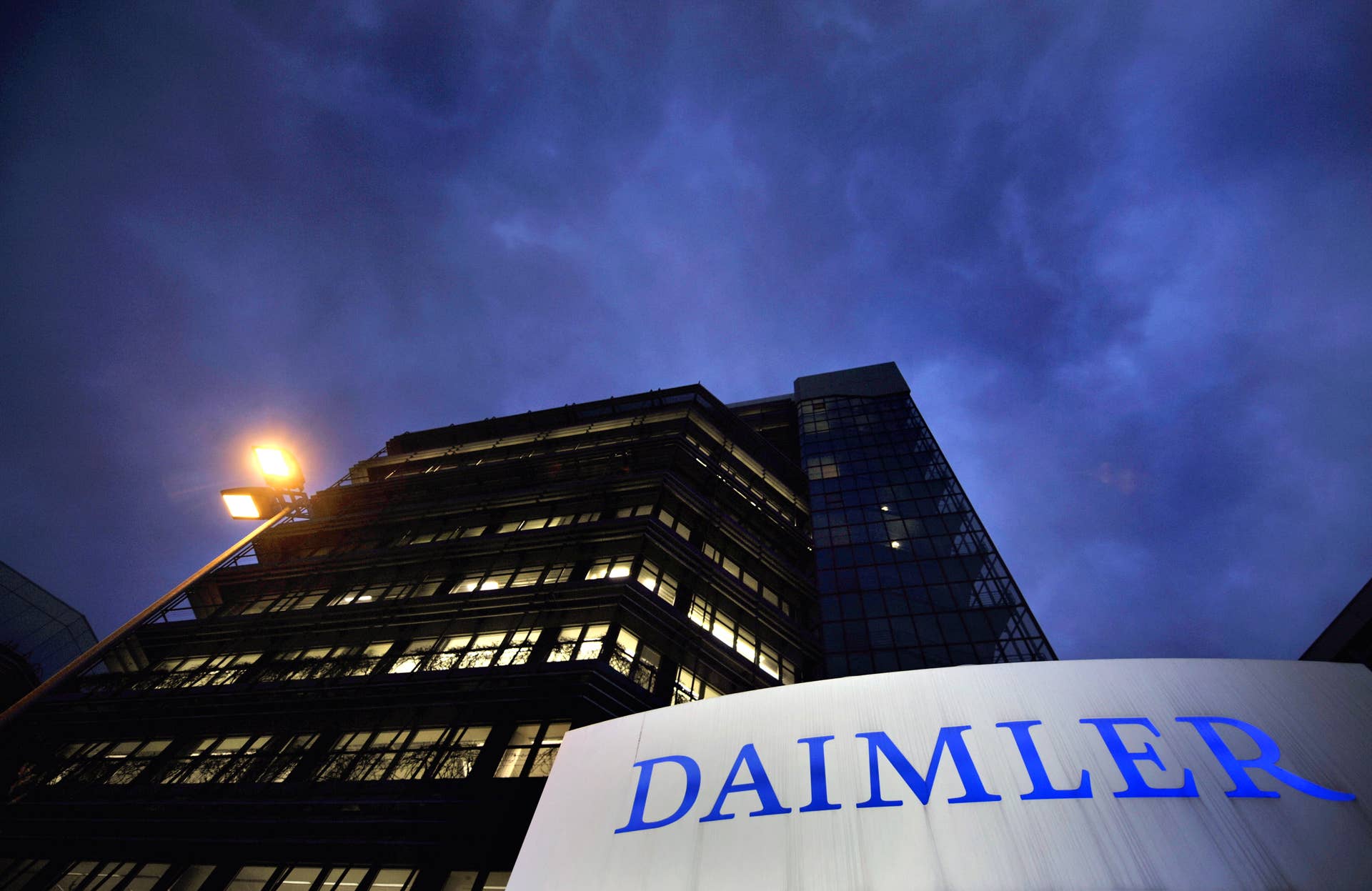 A sign reading 'Daimler' can be seen in front of the Mercedes Benz plant of German auto giant Daimler AG in Stuttgart-Untertuerkheim, southern Germany on March 25, 2010. Japan's Nissan is in talks to join Renault of France and Germany's Daimler in a three-way deal to hold up to five percent of each others' shares, reports said on March 26, 2010. AFP PHOTO DDP / SASCHA SCHUERMANN GERMANY OUT (Photo credit should read SASCHA SCHUERMANN/AFP/Getty Images)