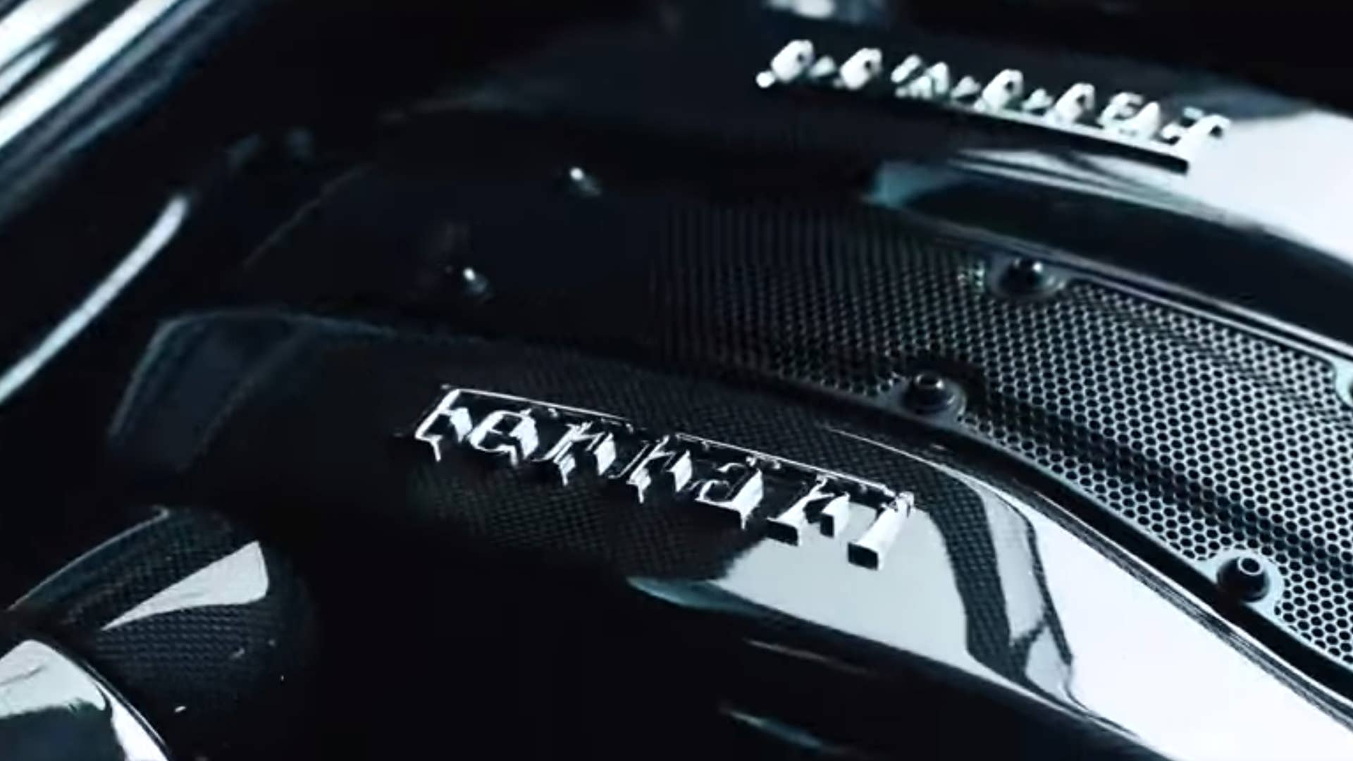 What looks like a V8 appears in a teaser for a soon-to-be-revealed Ferrari.