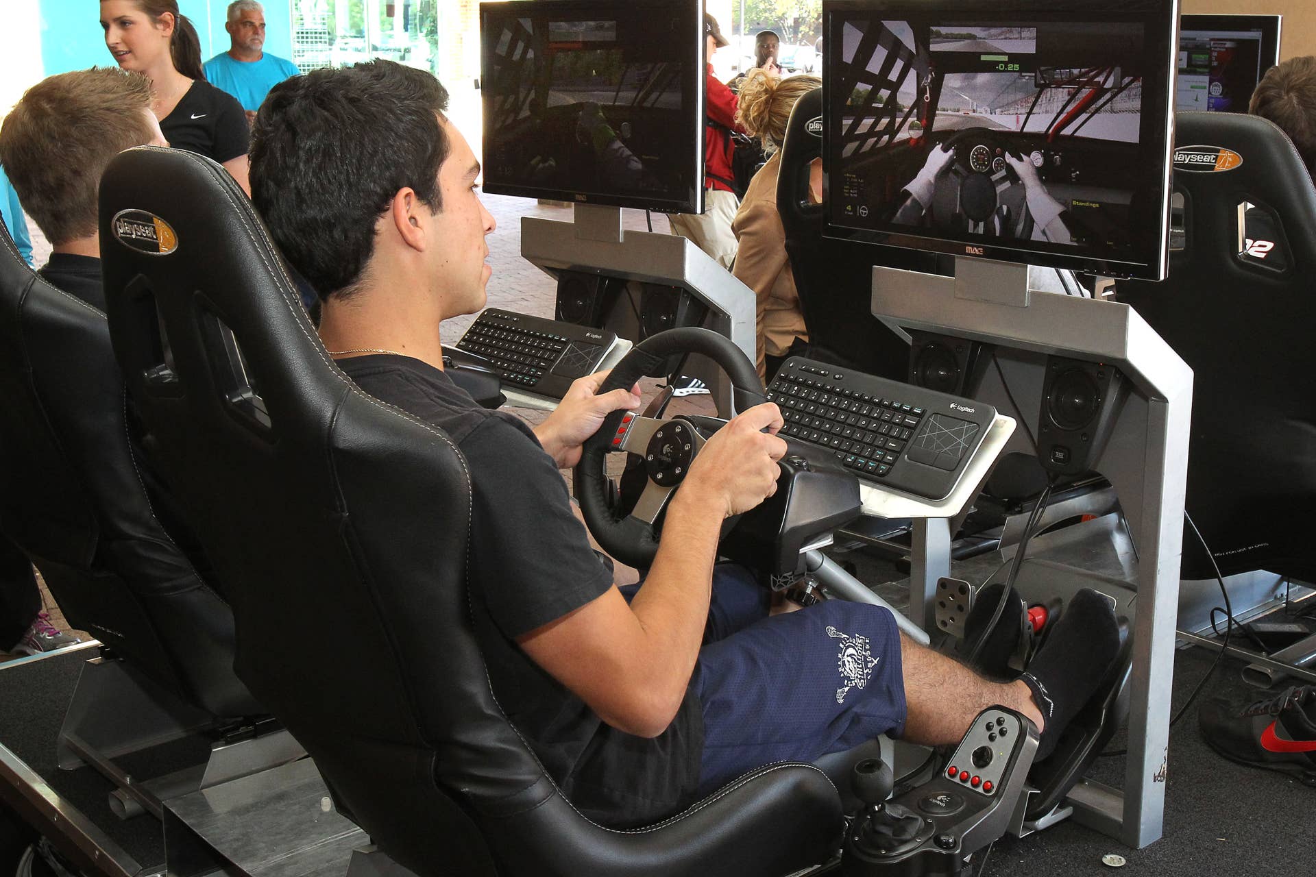 HAMPTON, VA - OCTOBER 16: Jack Madrid of San Clemente, California, takes a turn on the IRacing simulator during the NASCAR Drive For Diversity Combine at Hampton University on October 16, 2012 in Hampton, Virginia. (Photo by Tom Whitmore/Getty Images for NASCAR)