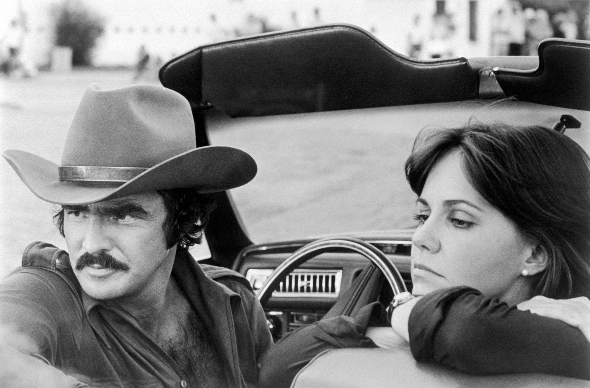 (Original Caption) Burt Reynolds and Sally Field in a scene from the movie, Smokey and the Bandit.