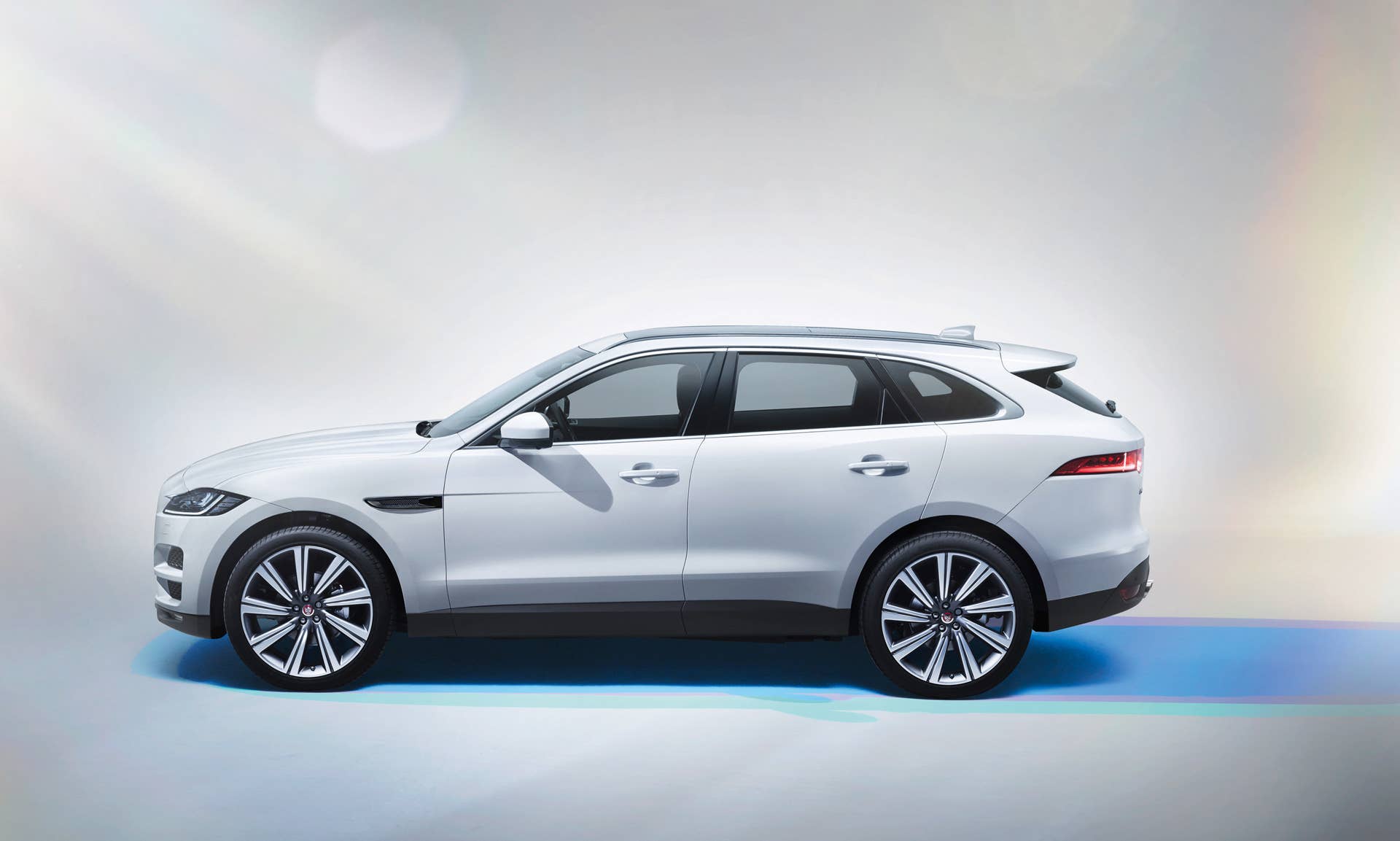 jaguar f-pace 2017 profile parked studio
