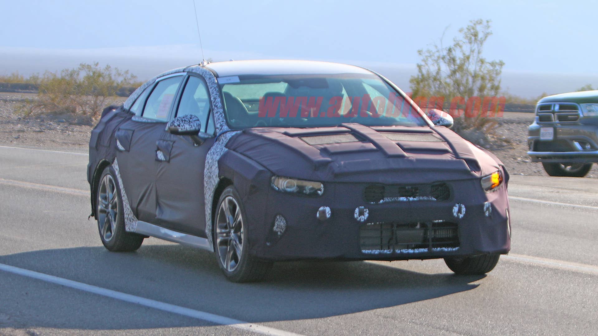 Kia Optima in camouflage