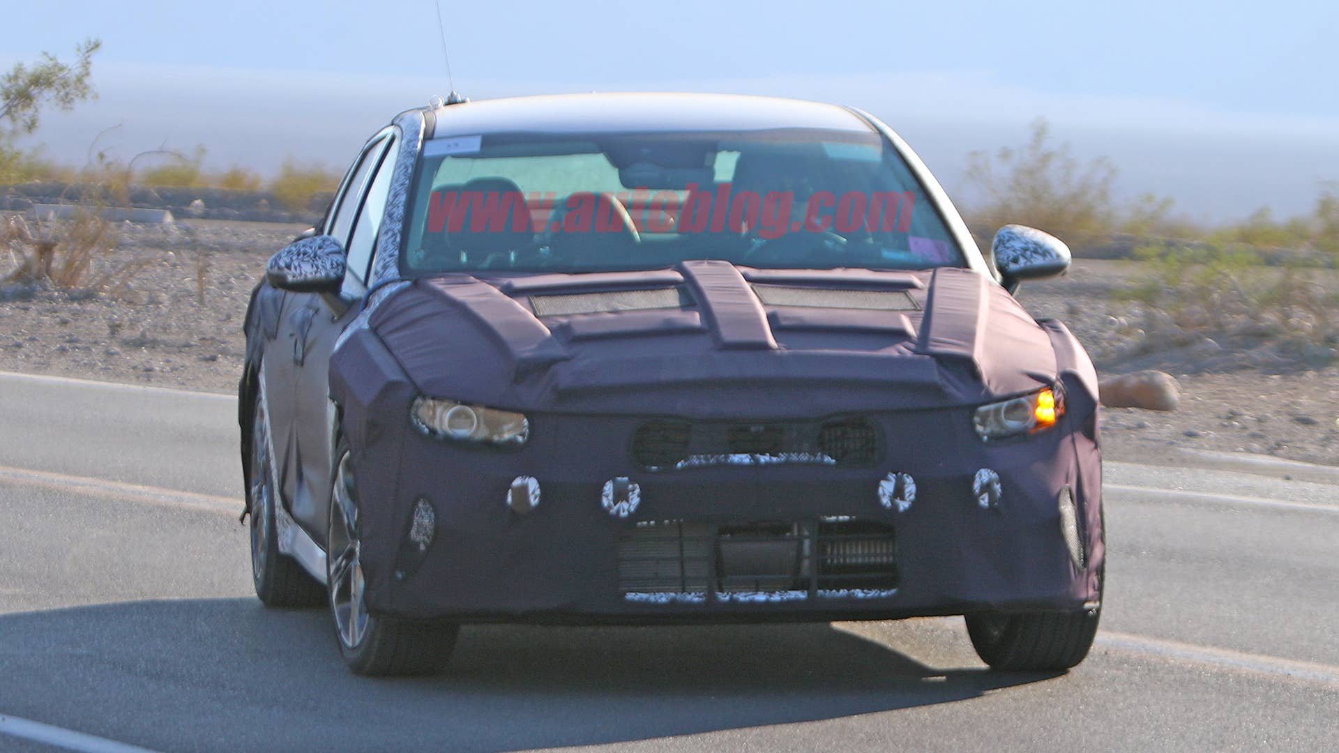 Kia Optima in camouflage