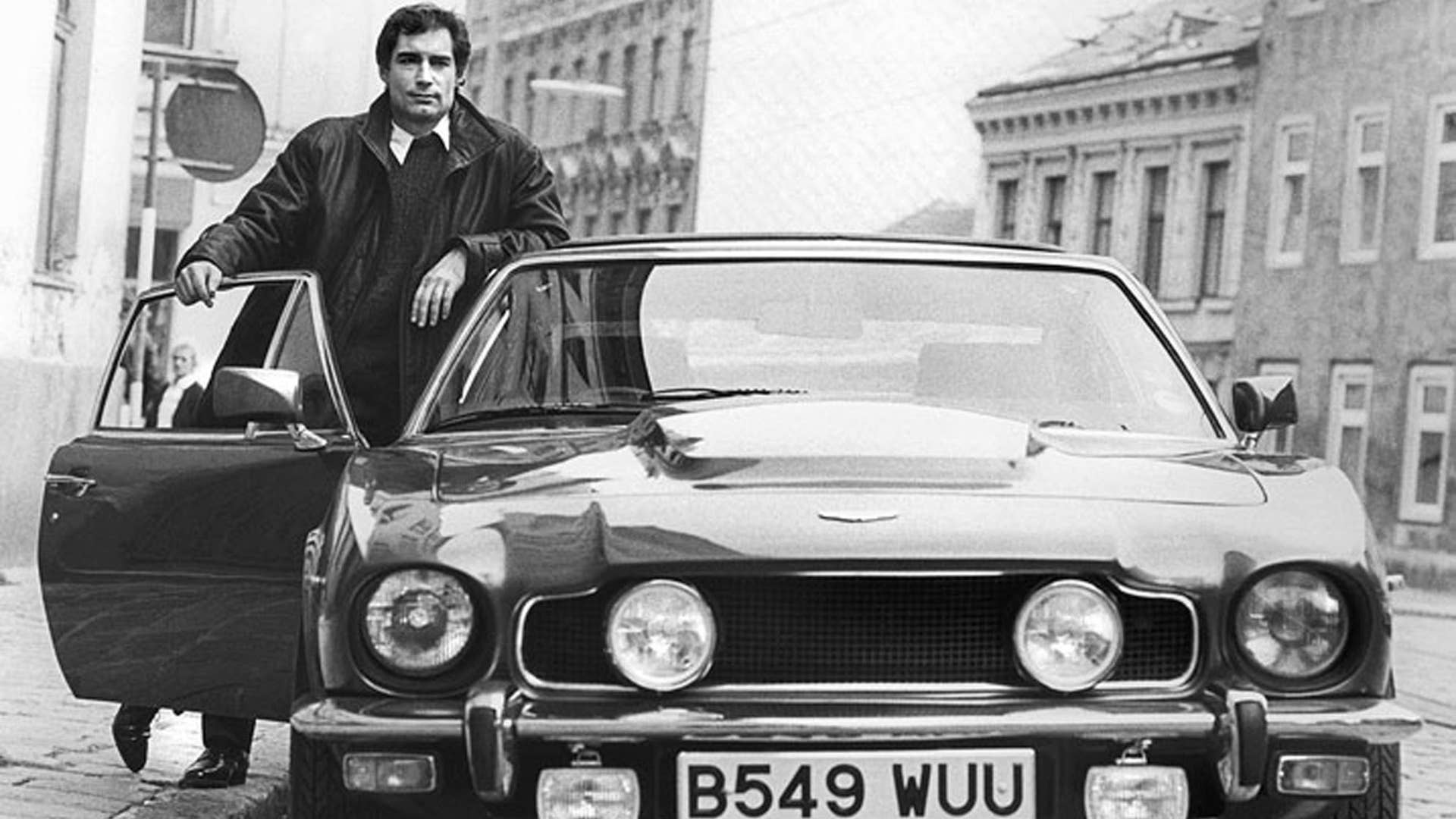 New James Bond Timothy Dalton gets a proper introduction to the role, as Q hands him the keys to an Aston Martin V8 Vantage.
