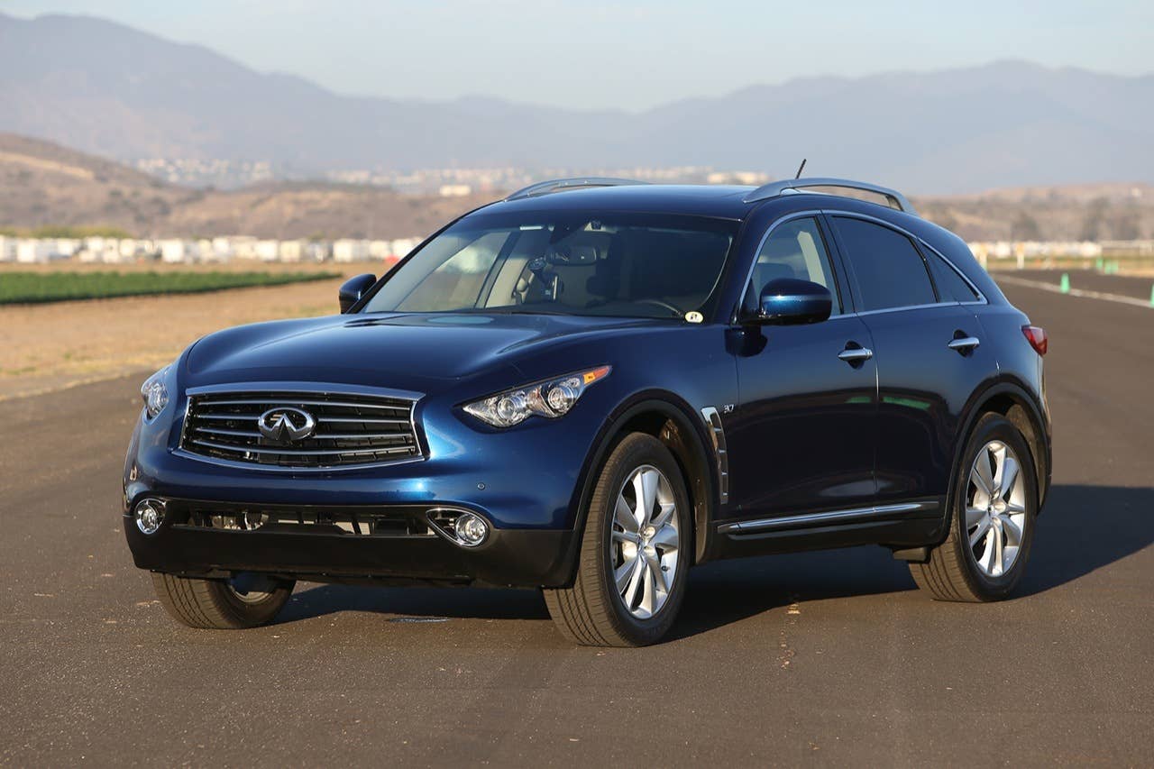 The 2014 Infiniti QX70 is a fusion of luxury, performance and SUV utility. Its aggressive styling and personalized driver's cockpit serve notice of its performance underpinnings, with its long hood, stretched wheelbase, short front and rear overhangs and available 21-inch wheels and tires.
