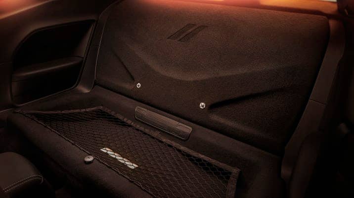 Standard drag-race interior configuration of the 2018 Dodge Challenger SRT Demon has rear seats removed; first-ever, factory-production Challenger with a rear-seat delete.