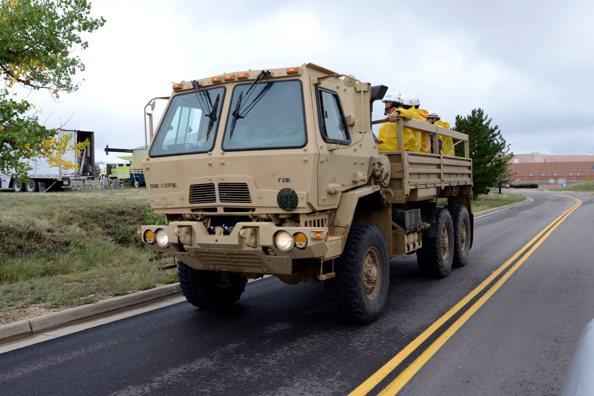 National Guardsmen riding in a troop carrier. Boulder Airport was turned into the forward operating base for the National Guard as rescue operations continue to evacuate and rescue victims of the disastrous 100 year flooding following a rainstorm along the front range of Colorado Sept 15th 2013 (Photo by Christopher Rogers/Corbis via Getty Images)