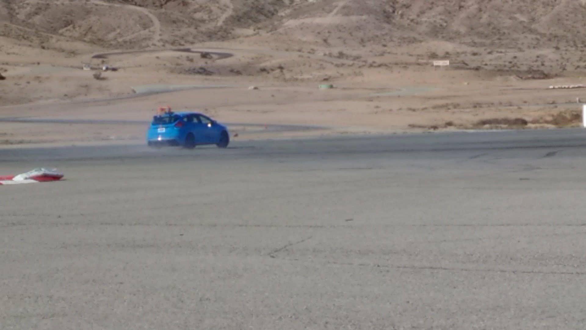 A demonstration in tire shredding by the Ford Focus RS.