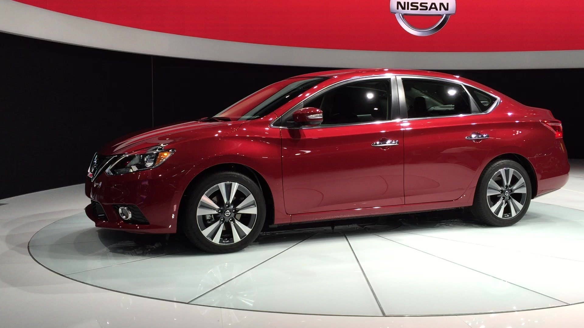 The new 2016 Nissan Sentra goes for a spin on the stand at the 2015 LA Auto Show.
