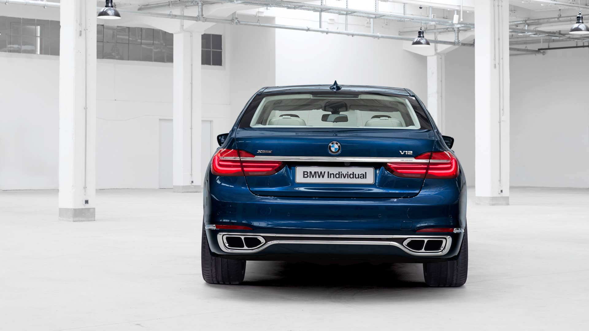 BMW M760i xDrive The Next 100 Years Edition rear studio