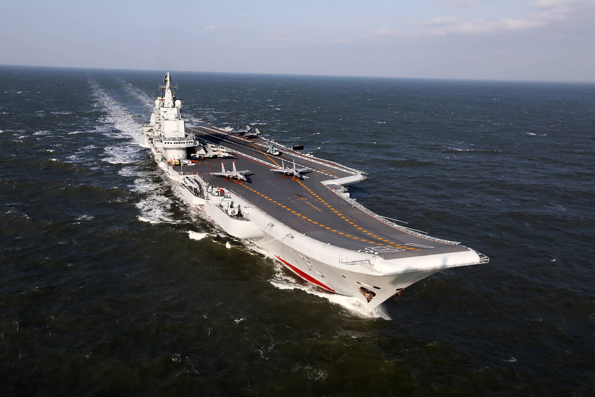 This photo taken on December 24, 2016 shows the Liaoning, China's only aircraft carrier, sailing during military drills in the Pacific. Taiwan's defence minister warned on December 27 that enemy threats were growing daily after China's aircraft carrier and a flotilla of other warships passed south of the island in an exercise as tensions rise. / AFP / STR / China OUT (Photo credit should read STR/AFP/Getty Images)