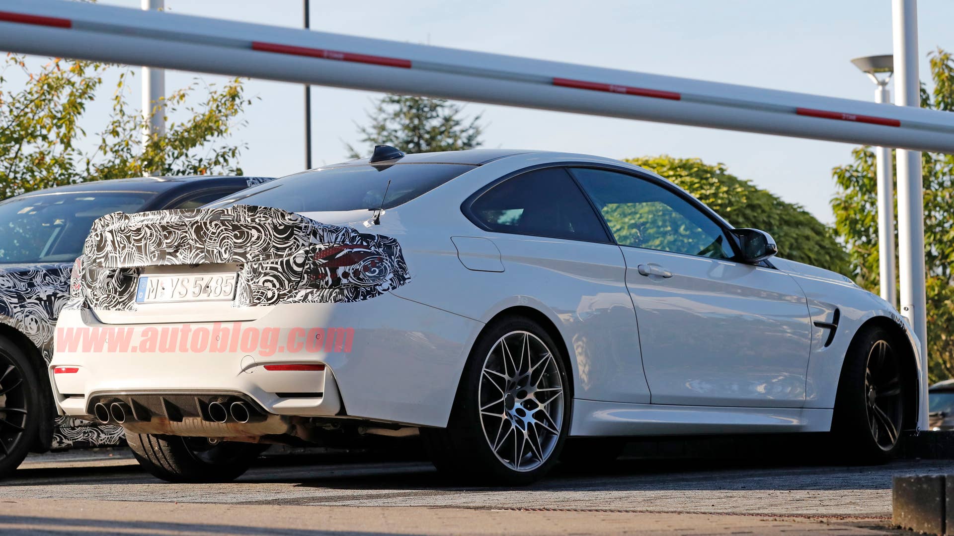BMW M4 Facelift Spy Shots Three Quarter Rear Exterior