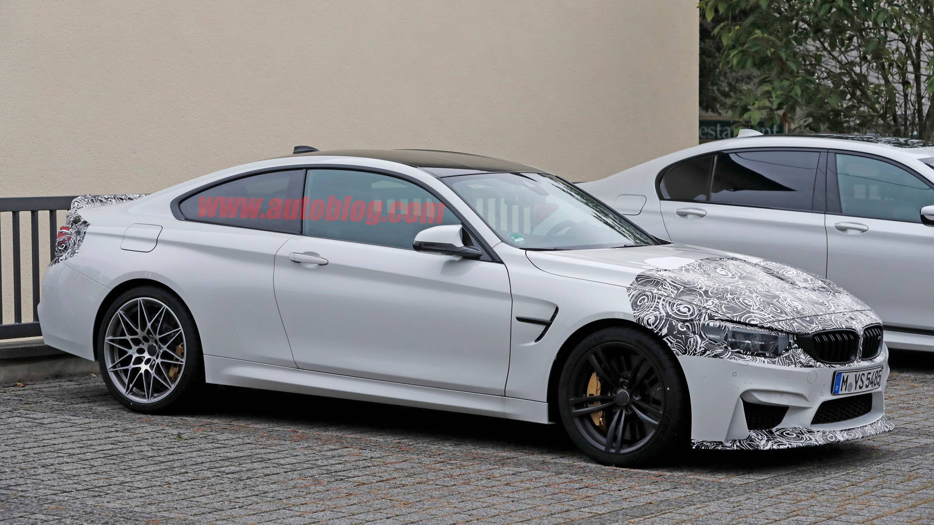 BMW M4 Facelift Spy Shots Three Quarter Front End Exterior