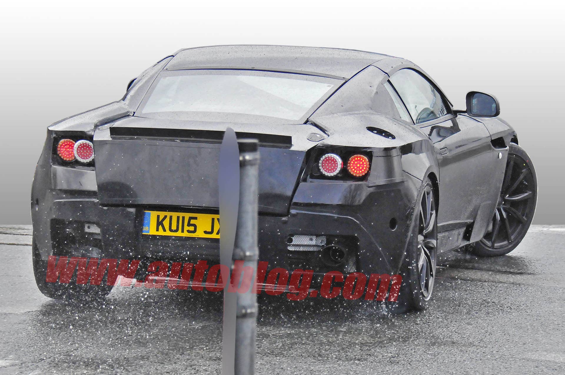 spy shots photos spied aston martin