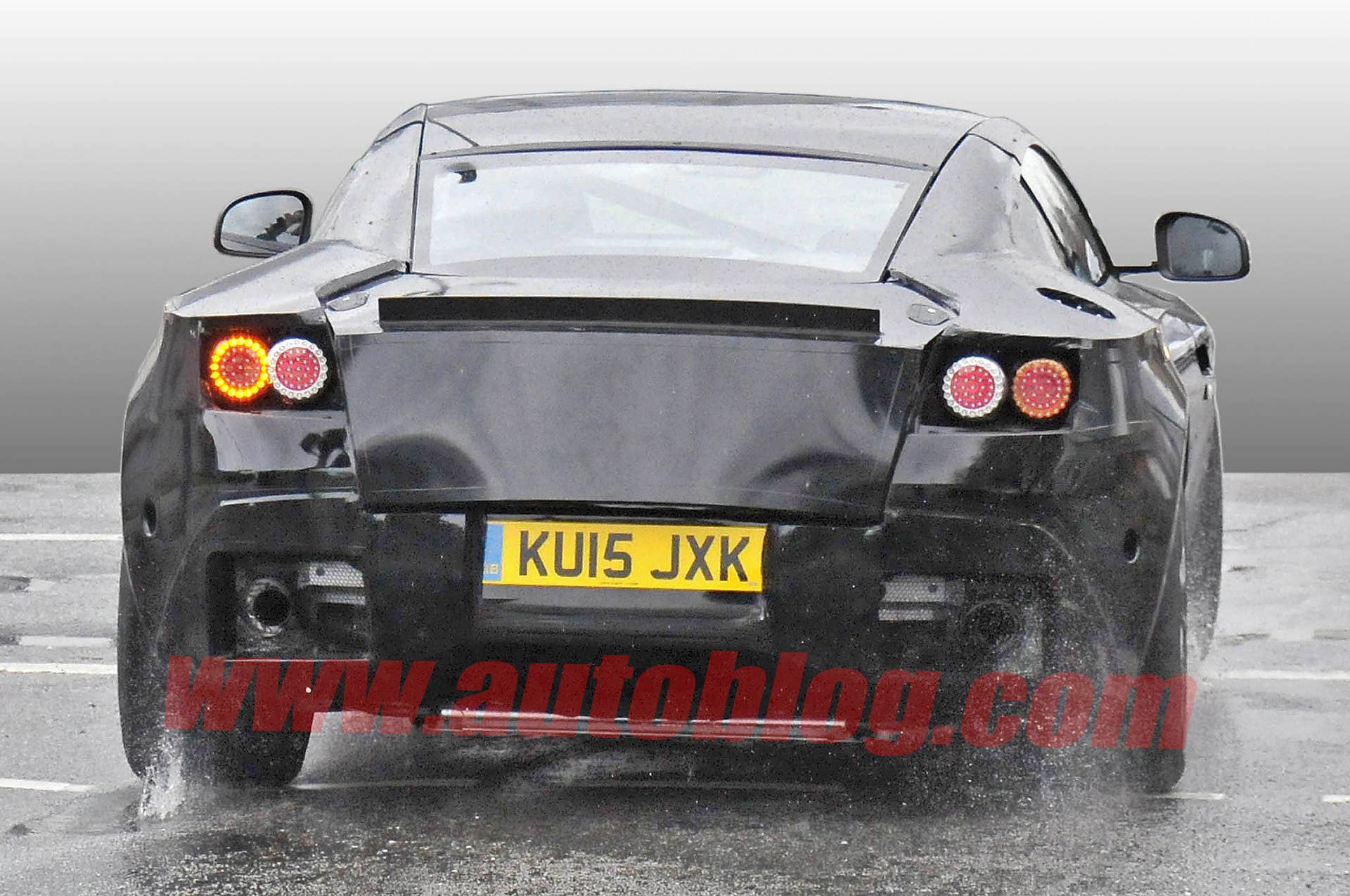 db9 spy photos aston martin camo
