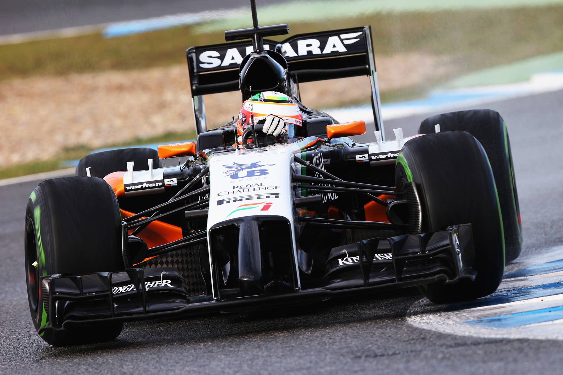 JEREZ DE LA FRONTERA, SPAIN - JANUARY 29:  Sergio Perez of Mexico and Force India drives during day two of Formula One Winter Testing at the Circuito de Jerez on January 29, 2014 in Jerez de la Frontera, Spain.  (Photo by Mark Thompson/Getty Images)