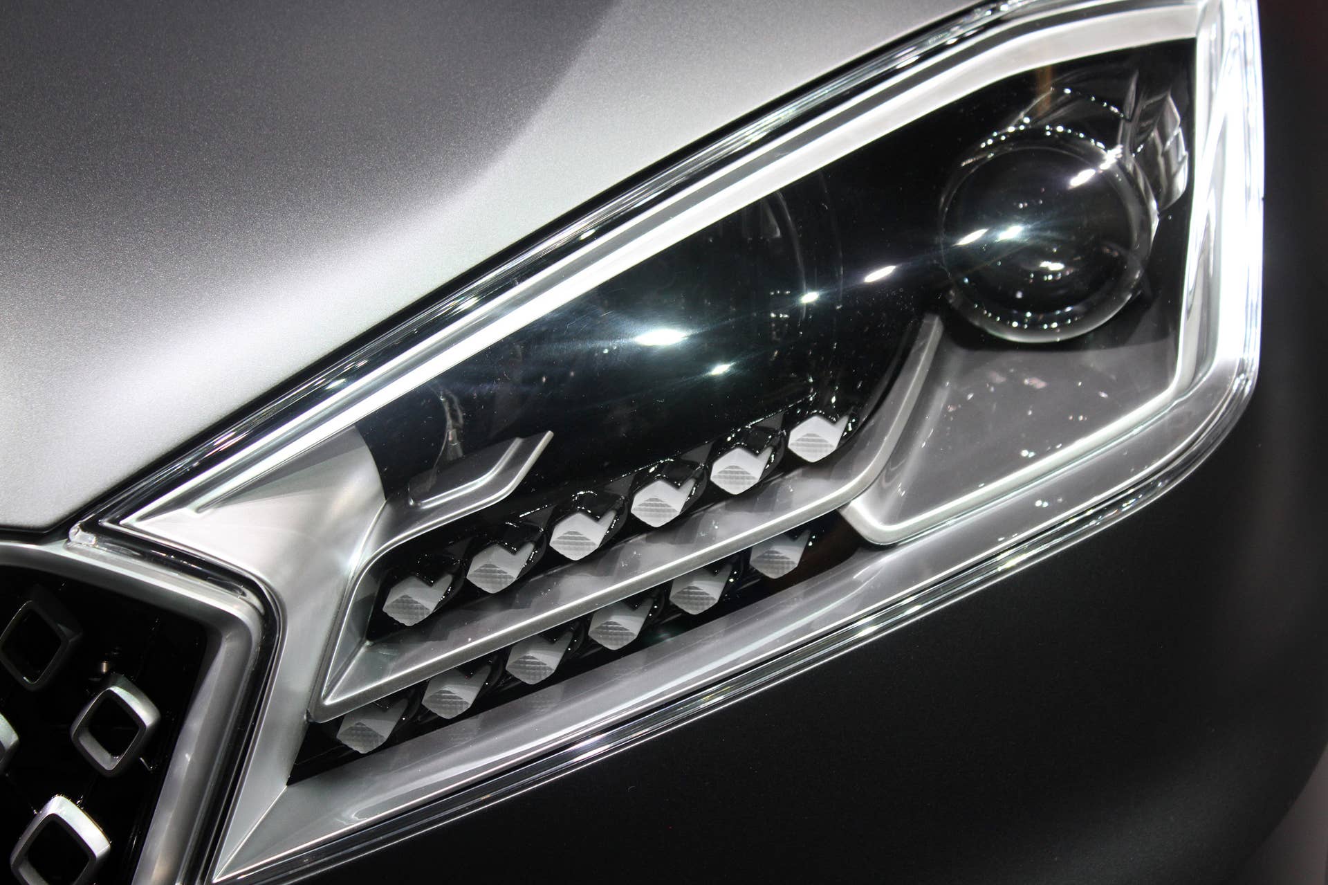 The Borgward BX7 TS, resurrecting the Borgward brand name after 50 years, unveiled at the 2015 Frankfurt Motor Show, headlight detail.