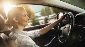 Businesswoman driving car