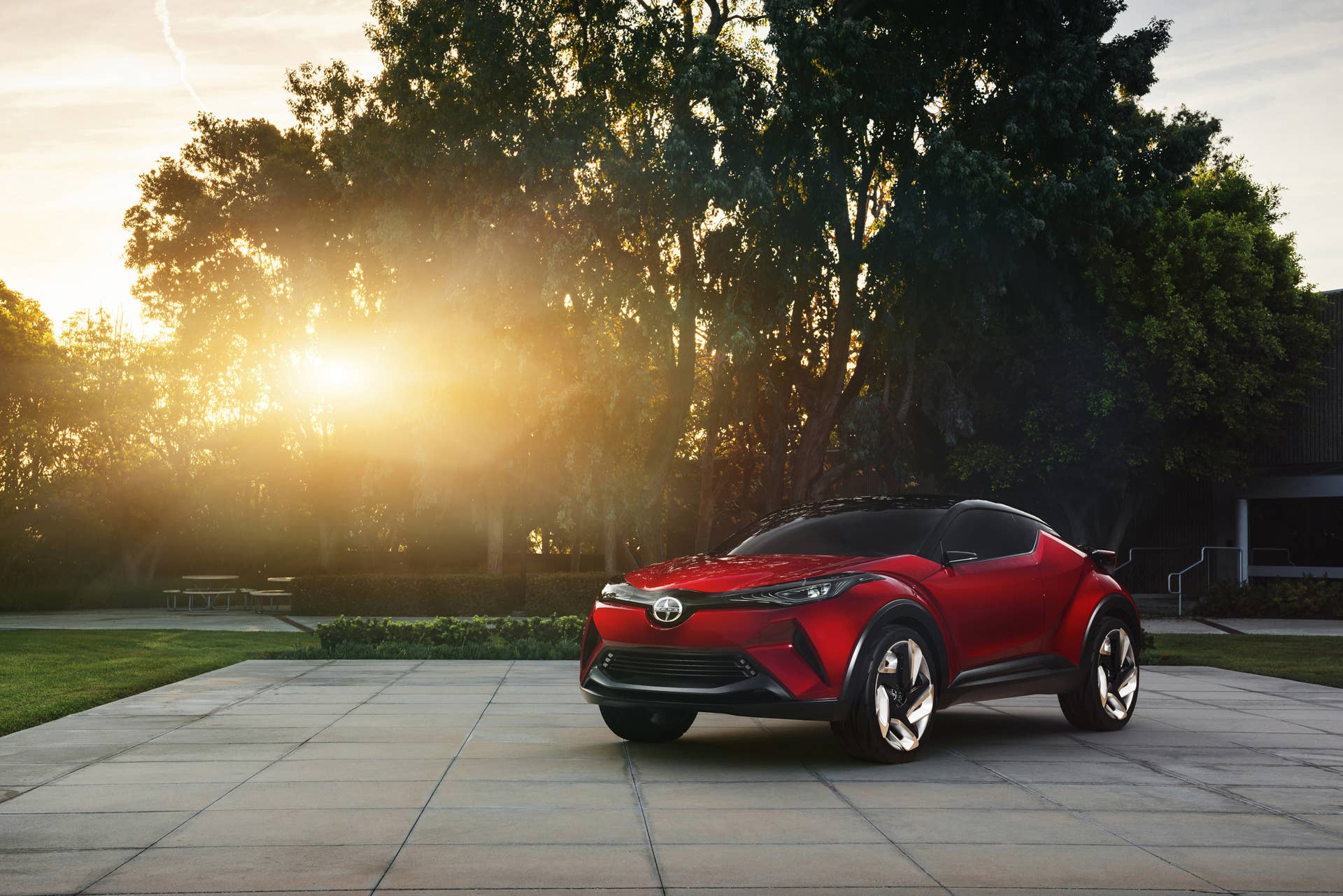 The Scion C-HR concept shown off in red for the LA Auto Show, front three-quarter view.