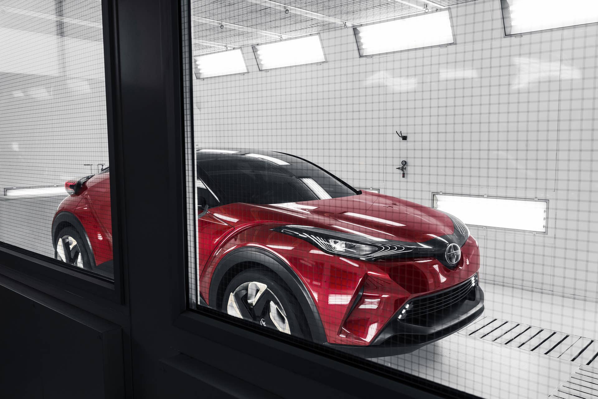 The Scion C-HR concept shown off in red for the LA Auto Show, interior paint booth.