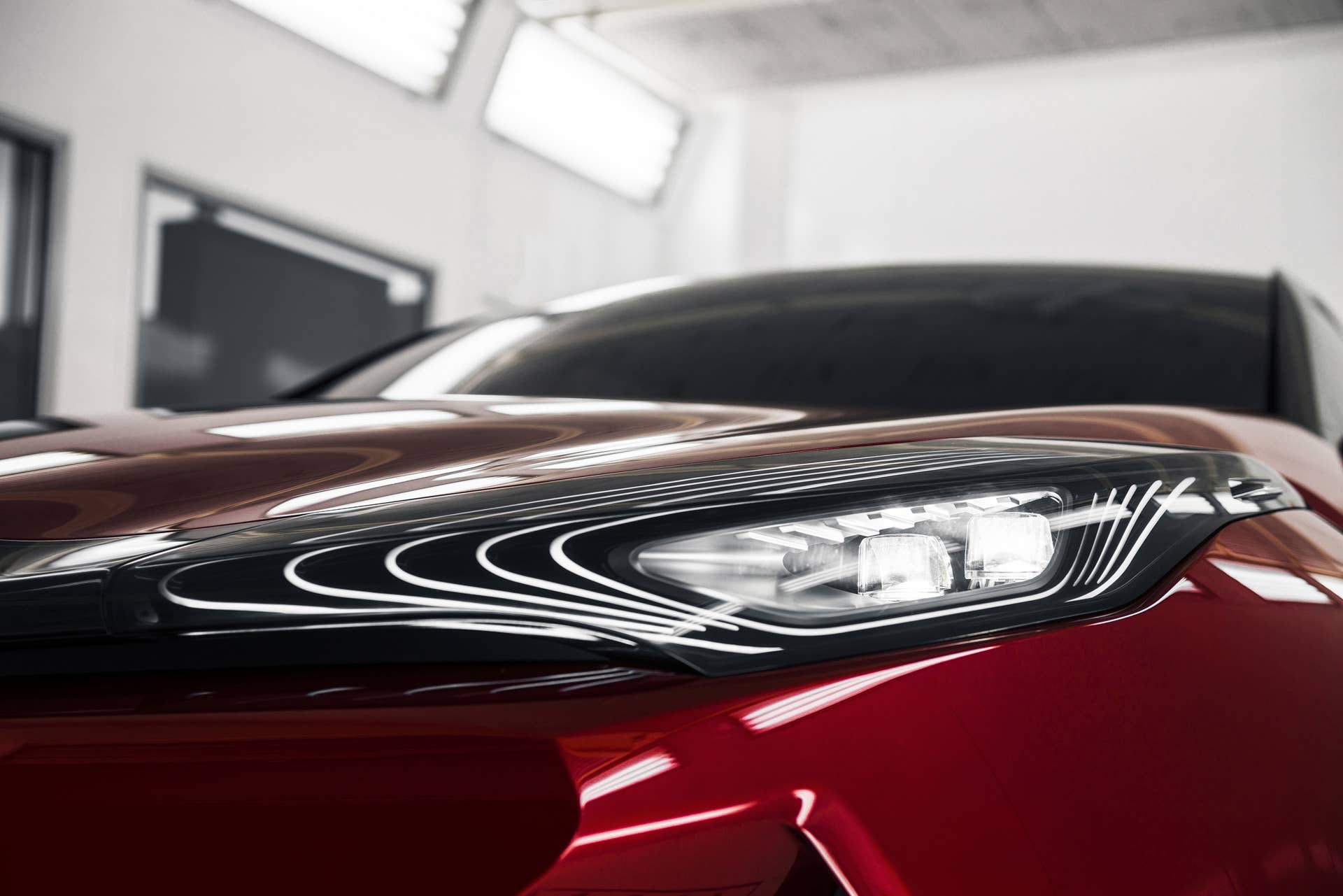 The Scion C-HR concept shown off in red for the LA Auto Show, headlight.