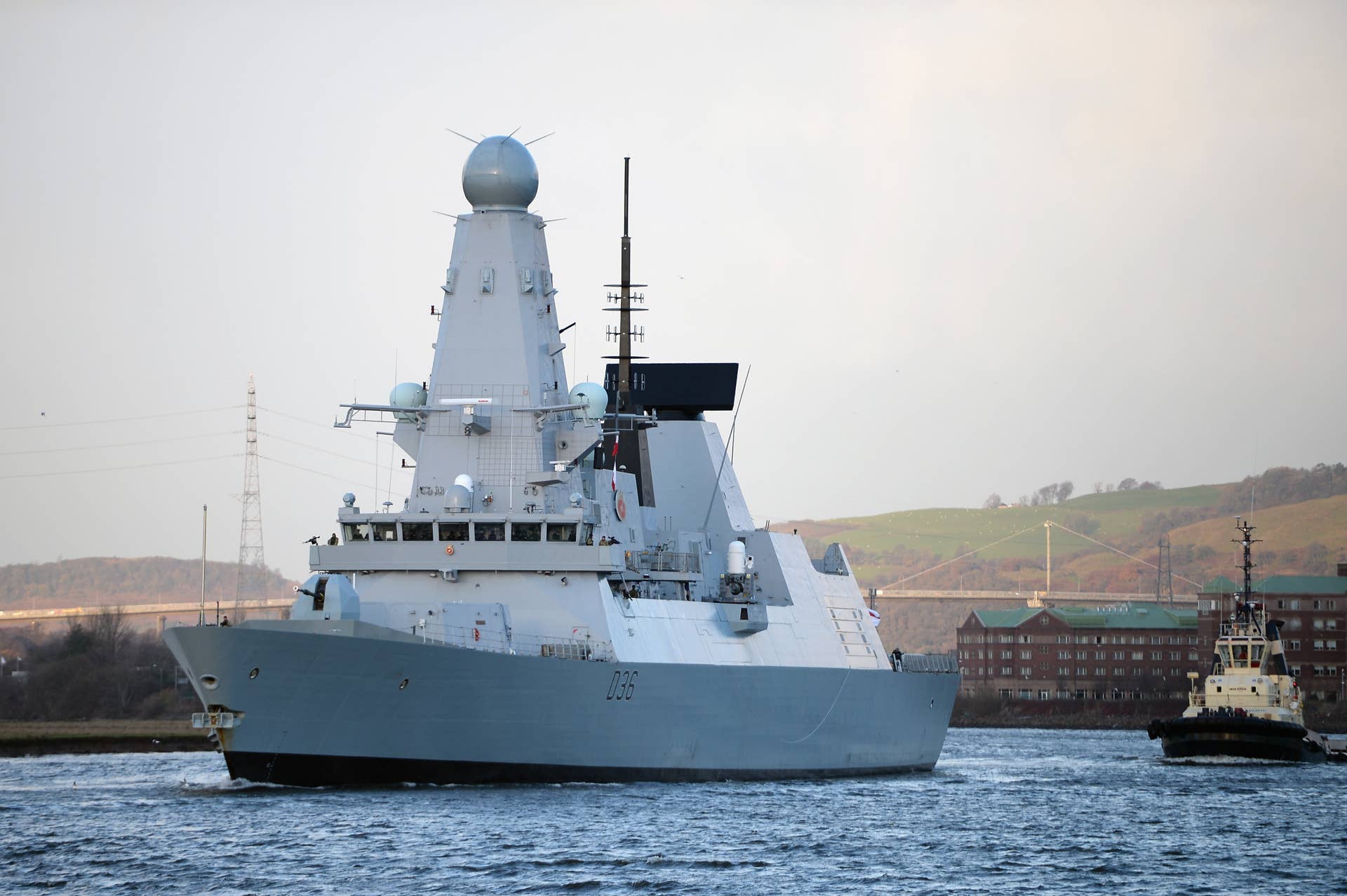 GLASGOW, SCOTLAND - NOVEMBER 29: HMS Defender makes its way up the River Clydeon November 29, 2013 in Glasgow, Scotland. HMS Defender is one of the Royal Navy's new Type 45 destroyers, and has returned to Glasgow where it was built for the first time since becoming a fully fledged member of the fleet and will be open to the public tomorrow. (Photo by Jeff J Mitchell/Getty Images)