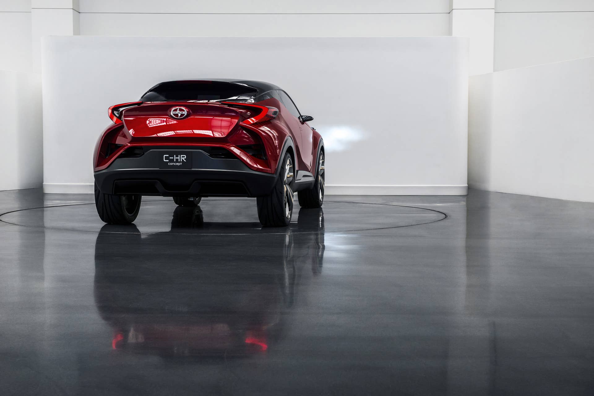 The Scion C-HR concept shown off in red for the LA Auto Show, rear view.
