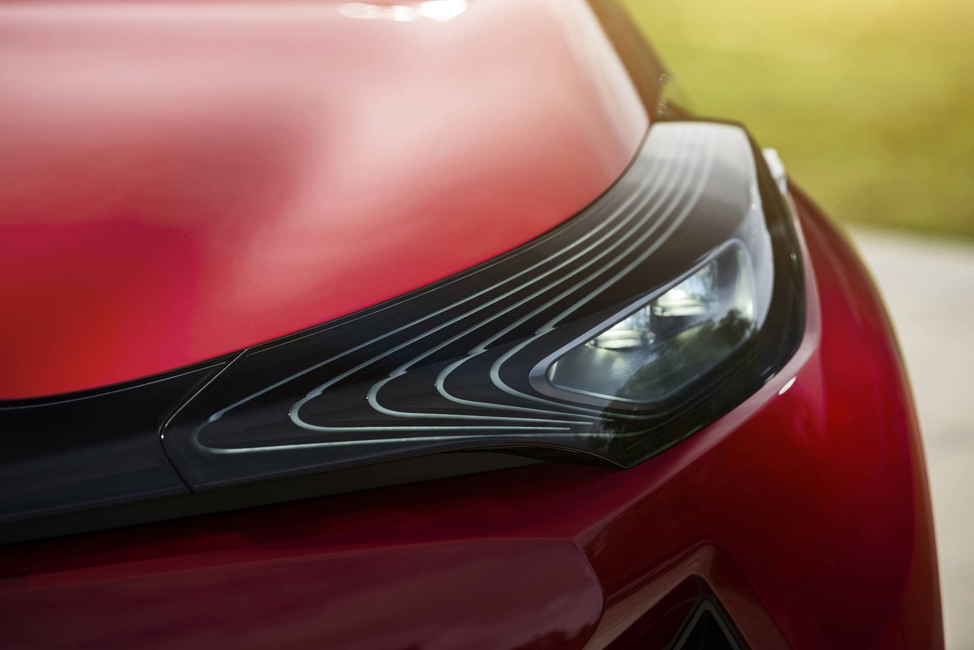 The Scion C-HR concept shown off in red for the LA Auto Show, headlight detail.
