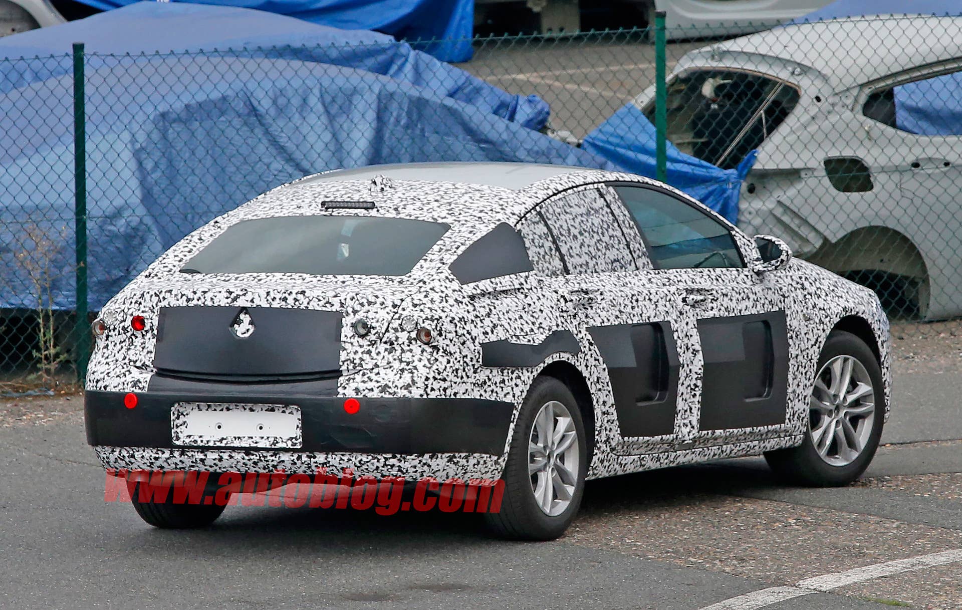 opel insignia sedan spy photo camouflage cladding