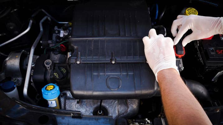 mechanic checks auto electronic ...