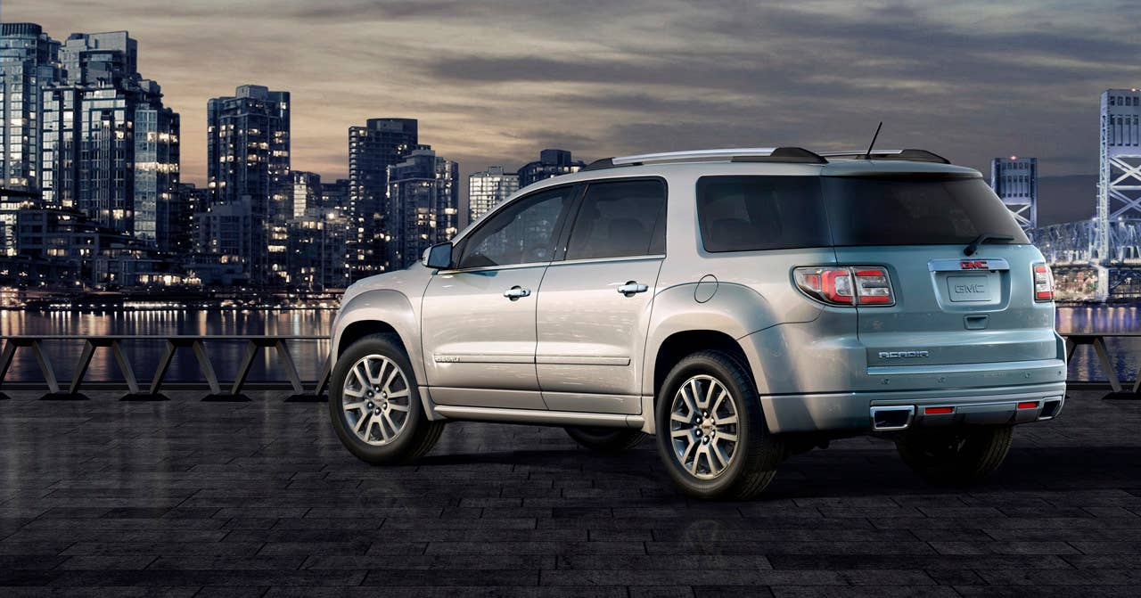 2012 GMC Acadia Denali 3/4 rear in white. (02/08/2012)