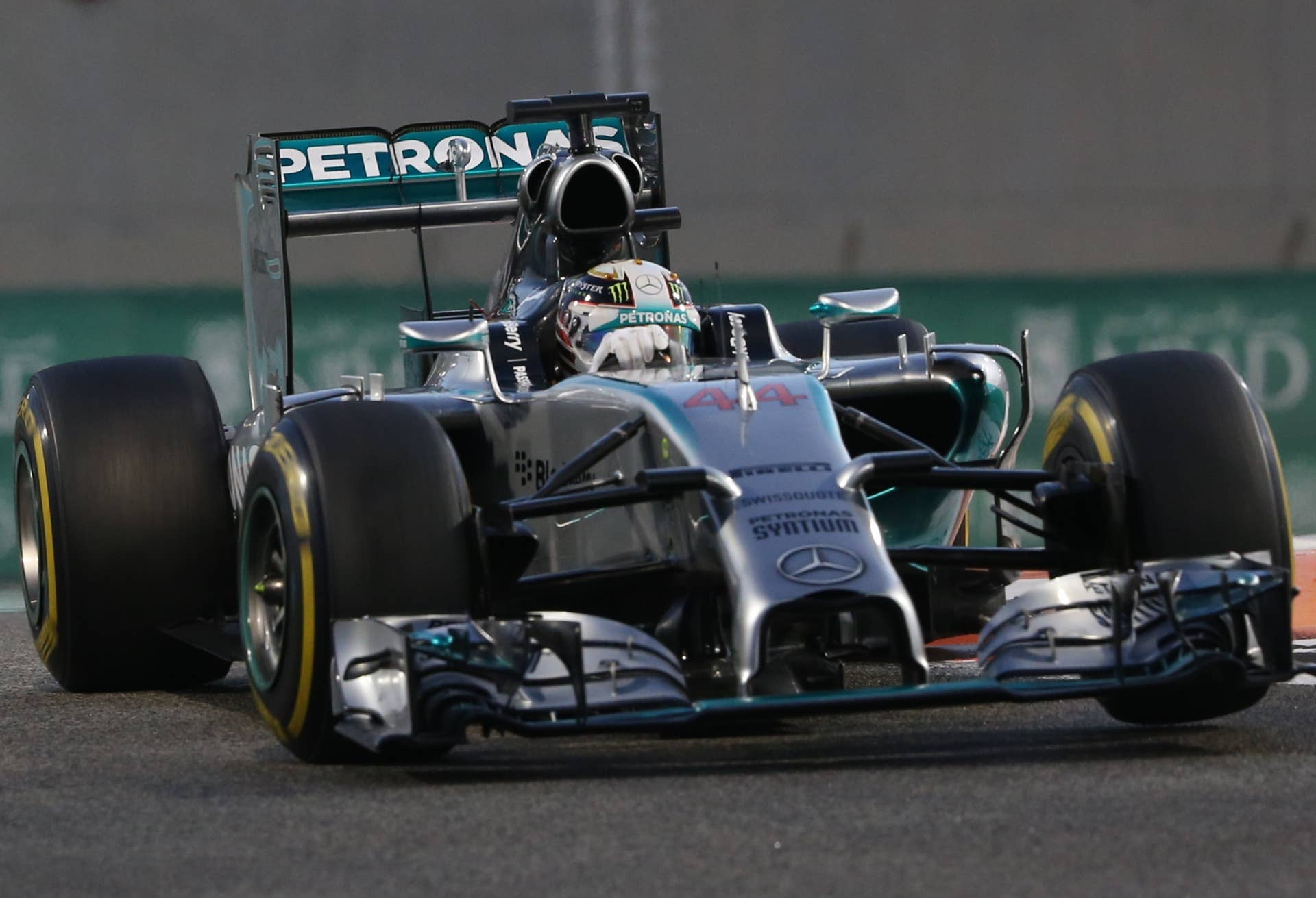 Mercedes-AMG's British driver  Lewis Hamilton races during the Abu Dhabi Formula One Grand Prix at the Yas Marina circuit on November 23, 2014.  AFP PHOTO / PATRICK BAZ        (Photo credit should read PATRICK BAZ/AFP/Getty Images)