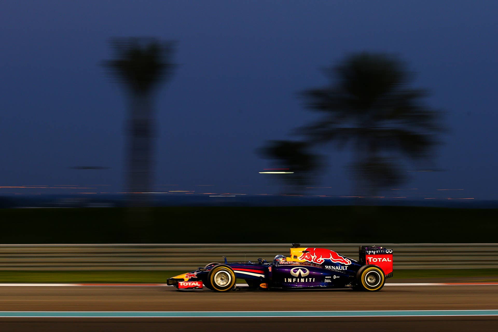 ABU DHABI, UNITED ARAB EMIRATES - NOVEMBER 23:  Sebastian Vettel of Germany and Infiniti Red Bull Racing drives during the Abu Dhabi Formula One Grand Prix at Yas Marina Circuit on November 23, 2014 in Abu Dhabi, United Arab Emirates.  (Photo by Mark Thompson/Getty Images)