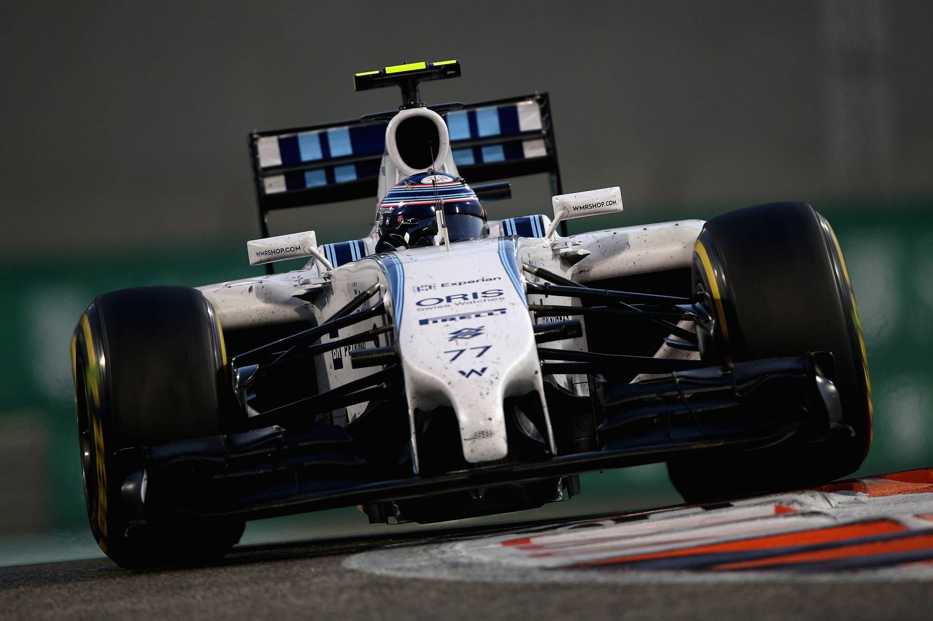 ABU DHABI, UNITED ARAB EMIRATES - NOVEMBER 23:  Valtteri Bottas of Finland and Williams drives during the Abu Dhabi Formula One Grand Prix at Yas Marina Circuit on November 23, 2014 in Abu Dhabi, United Arab Emirates.  (Photo by Clive Mason/Getty Images)