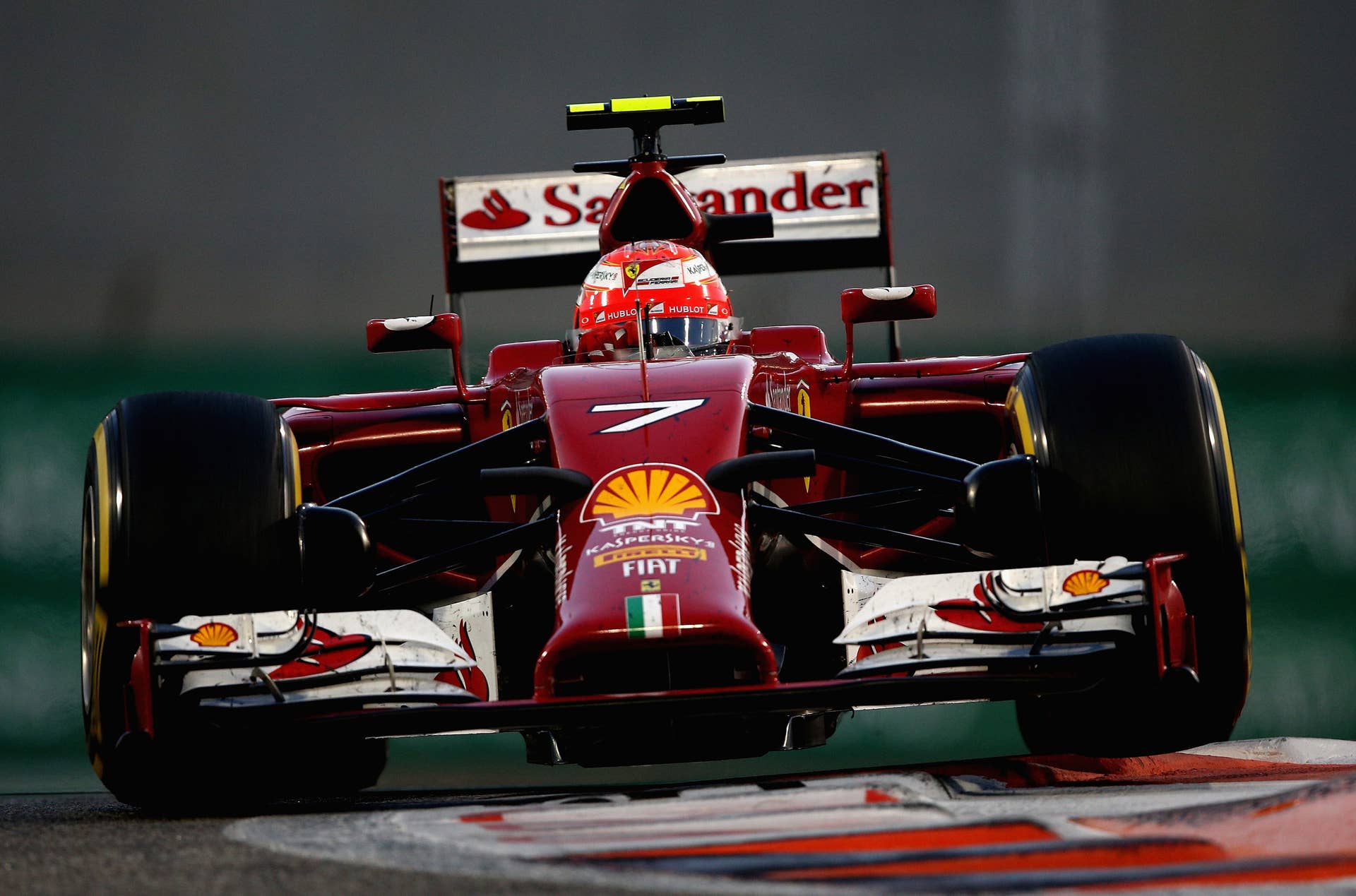ABU DHABI, UNITED ARAB EMIRATES - NOVEMBER 23:  Fernando Alonso of Spain and Ferrari drives during the Abu Dhabi Formula One Grand Prix at Yas Marina Circuit on November 23, 2014 in Abu Dhabi, United Arab Emirates.  (Photo by Clive Mason/Getty Images)