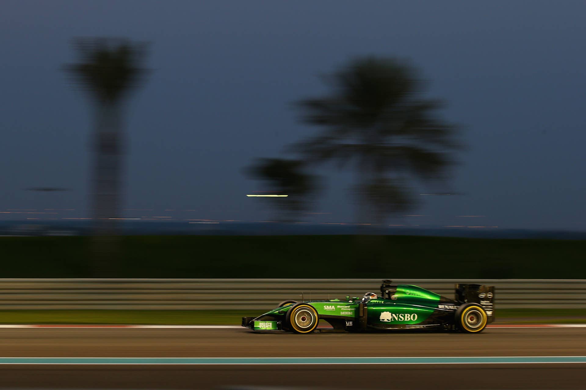 ABU DHABI, UNITED ARAB EMIRATES - NOVEMBER 23:  Kamui Kobayashi of Japan and Caterham drives during the Abu Dhabi Formula One Grand Prix at Yas Marina Circuit on November 23, 2014 in Abu Dhabi, United Arab Emirates.  (Photo by Mark Thompson/Getty Images)