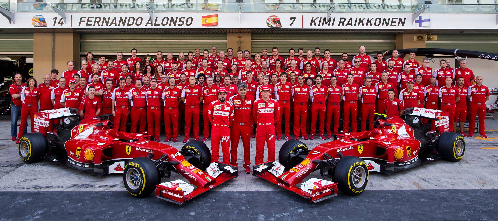 ABU DHABI, UNITED ARAB EMIRATES - NOVEMBER 22:  Fernando Alonso of Spain and Ferrari, Kimi Raikkonen of Finland and Ferrari and Ferrari Team Principal Marco Mattiacci pose with members of the team before final practice for the Abu Dhabi Formula One Grand Prix at Yas Marina Circuit on November 22, 2014 in Abu Dhabi, United Arab Emirates.  (Photo by Getty Images)