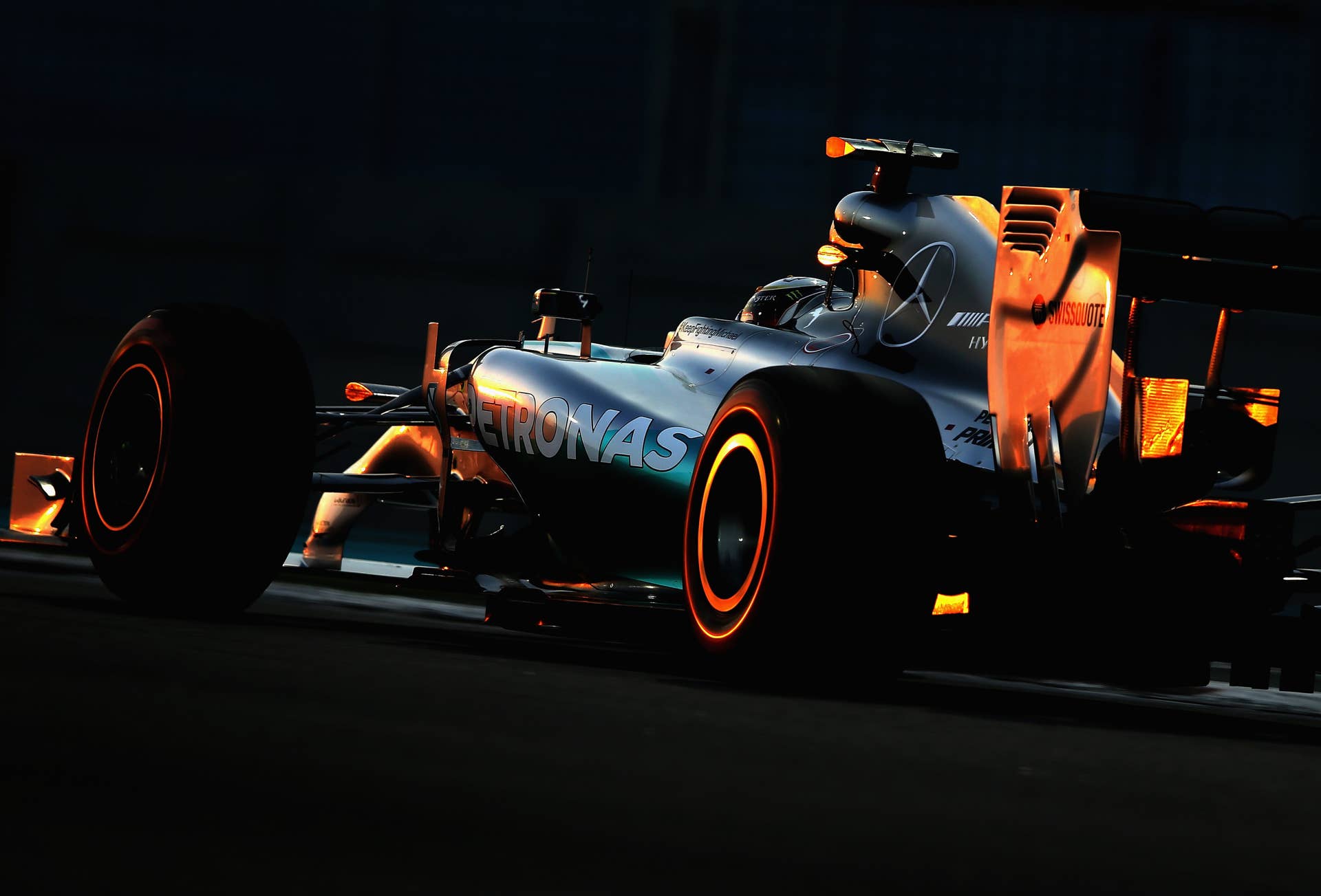 ABU DHABI, UNITED ARAB EMIRATES - NOVEMBER 23:  Lewis Hamilton of Great Britain and Mercedes GP drives during the Abu Dhabi Formula One Grand Prix at Yas Marina Circuit on November 23, 2014 in Abu Dhabi, United Arab Emirates.  (Photo by Clive Mason/Getty Images)