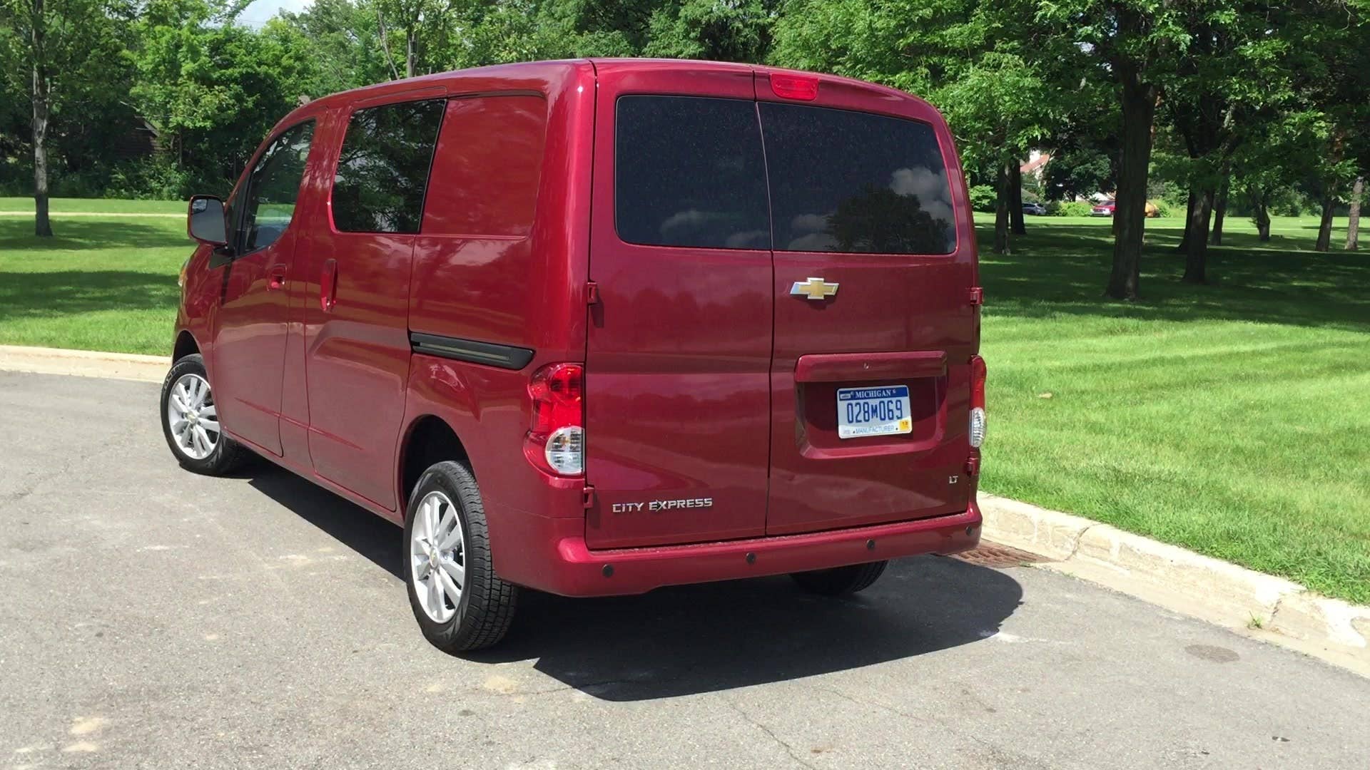 A look at the badges on the rear of the City Express cargo van, showing what was changed to make a Nissan into a Chevy.
