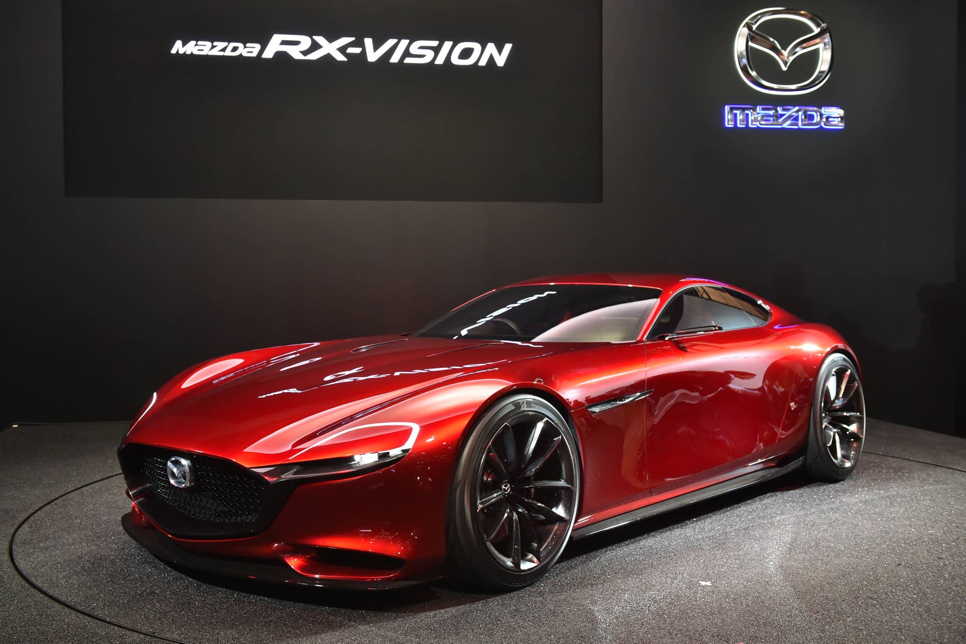 Mazda Motor displays the rotary sports concept, the Mazda RX-Vision at Tokyo Auto Salon 2016 at Makuhari Messe in Chiba on January 15, 2016. The exhibition, which is one of the largest annual custom car and car-related product shows, is being held from January 15 to January 17. AFP PHOTO / KAZUHIRO NOGI / AFP / KAZUHIRO NOGI (Photo credit should read KAZUHIRO NOGI/AFP/Getty Images)