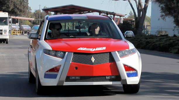 Carbon Motors E7 Police Cruiser: TRANSLOGIC 128