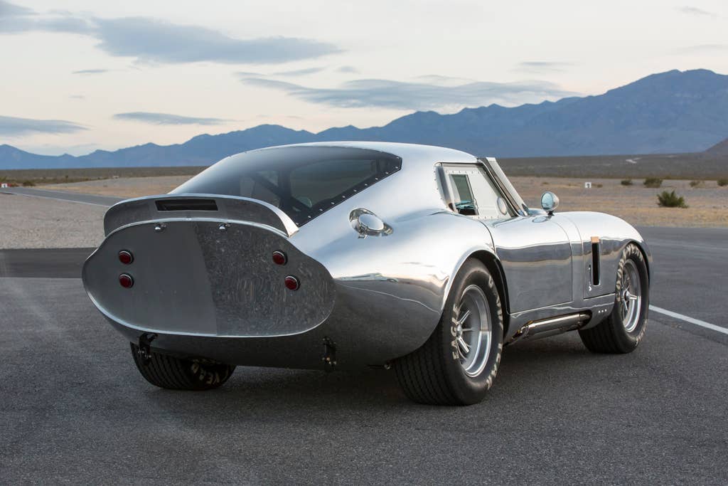 The aluminum Shelby American Continuation Daytona Coupe, rear three-quarter view.