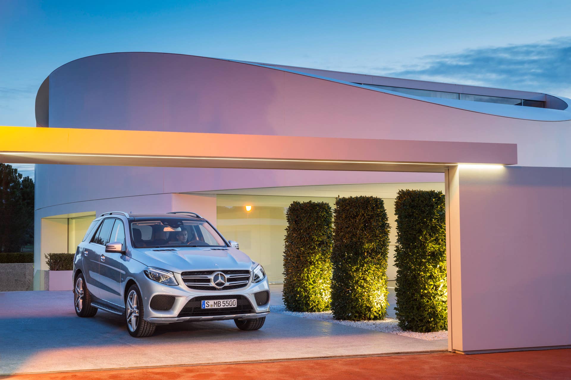 mercedes gle550e well lit modern house