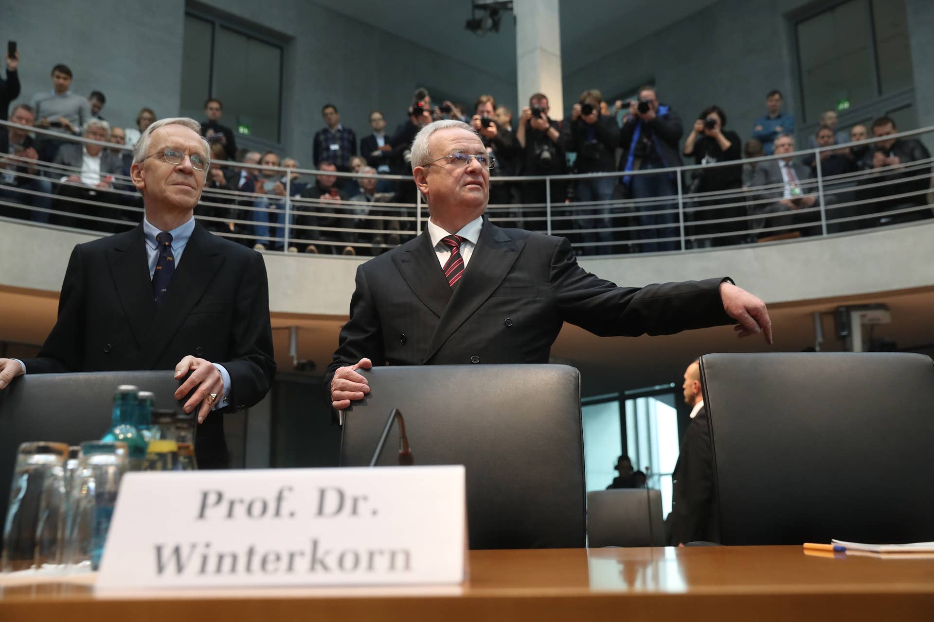 BERLIN, GERMANY - JANUARY 19: Martin Winterkorn (C), former CEO of German automaker Volkswagen AG, and a lawyer arrive to testify at the Bundestag commission investigating the Volkswagen diesel emissions scandal on January 19, 2017 in Berlin, Germany. Following the arrest of several Volkswagen employees by the FBI in the United States investigations are now focusing on when Winterkorn and other members of the VW management team knew about the cheating software installed in millions of Volkswagen cars worldwide. (Photo by Sean Gallup/Getty Images)