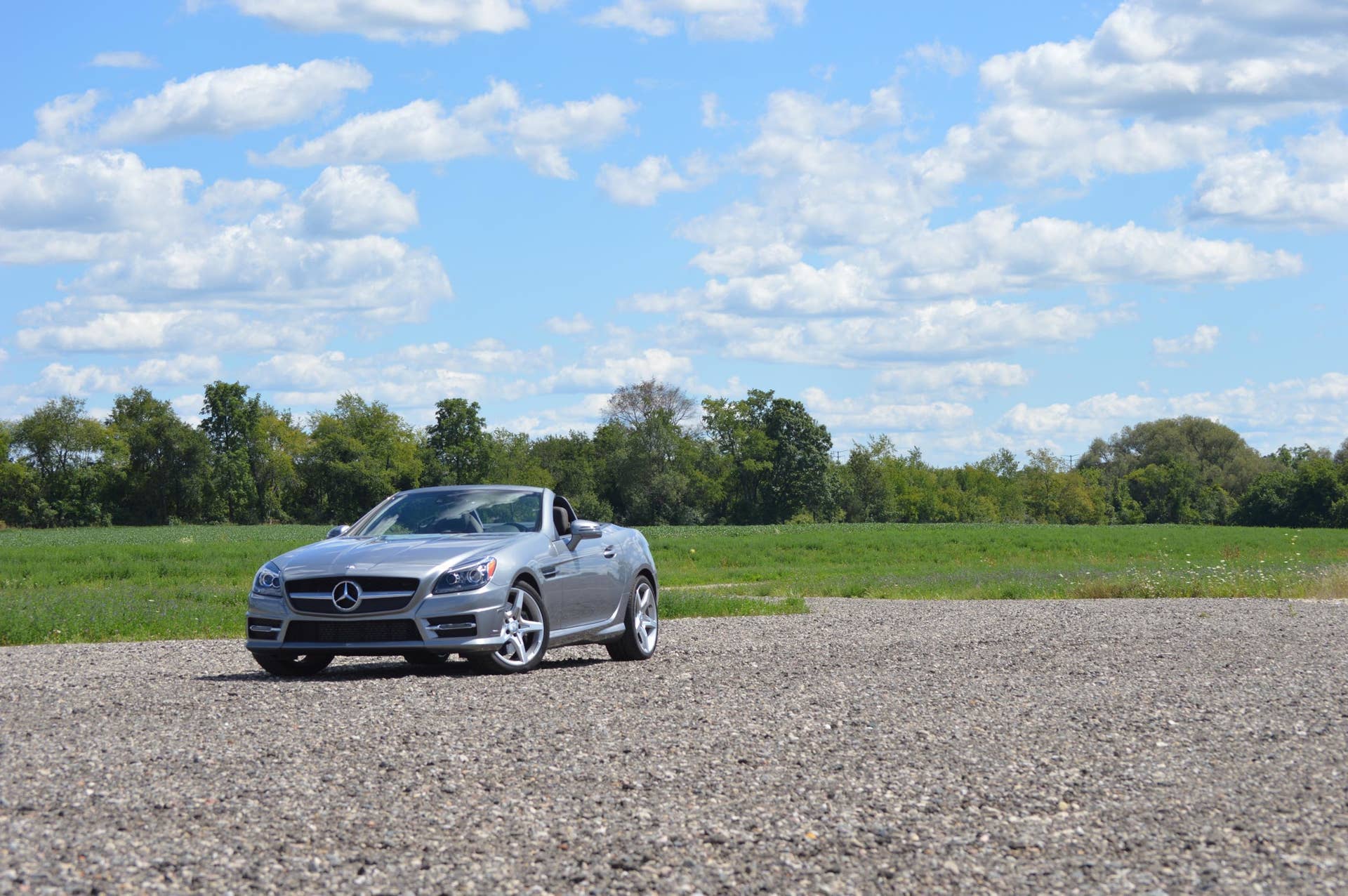 2015 mercedes-benz slk250 silver wide shot blue sky