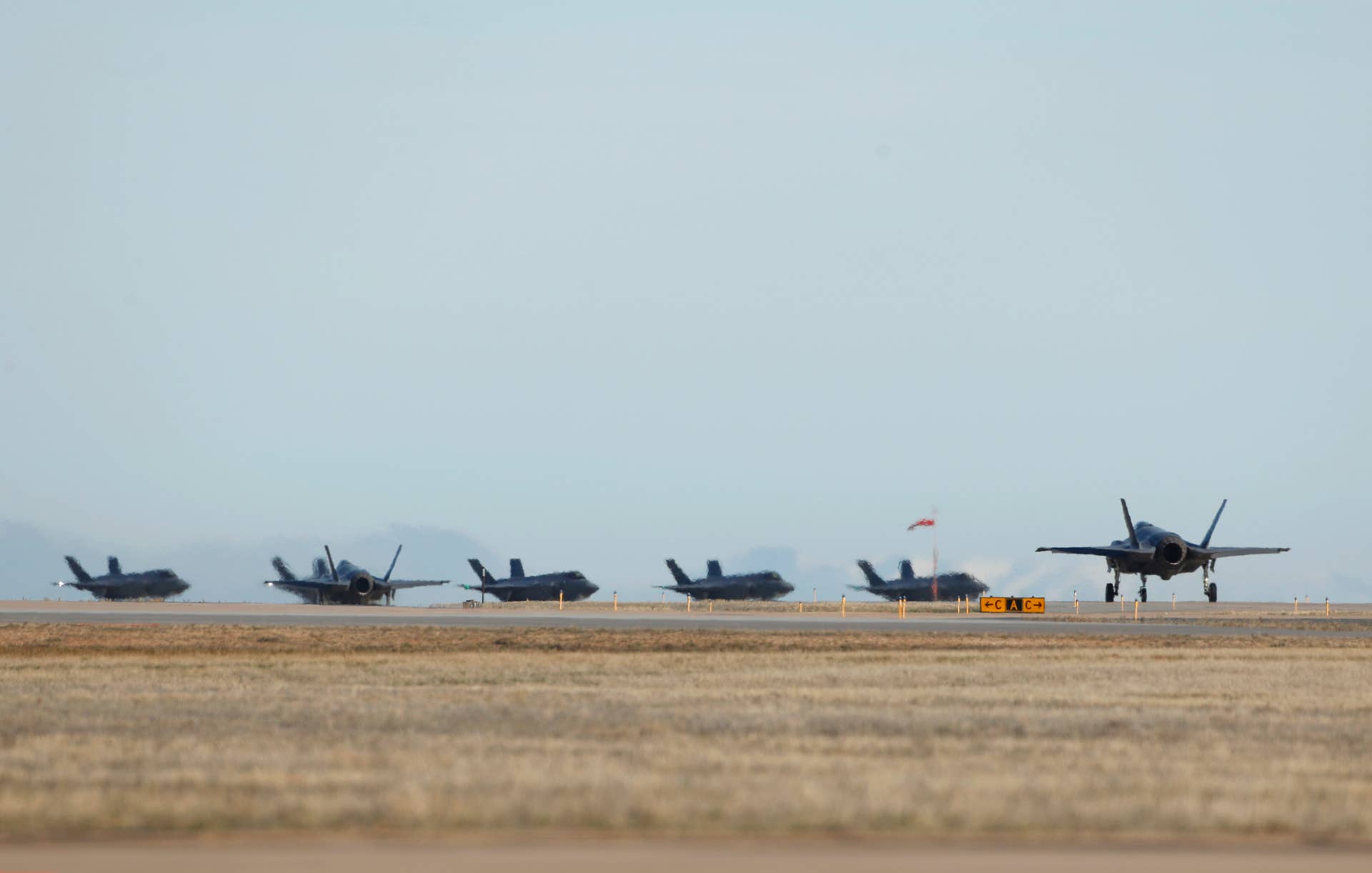 OGDEN, UT - MARCH 15: A row of F-35 fighter jet prepare for take-off for a training mission at Hill Air Force Base on March 15, 2017 in Ogden, Utah. Hill is the first Air Force base to get combat ready F-35's. They currently have 17 that might be deployed in the fight against terrorism and ISIS in the near future. (Photo by George Frey/Getty Images)